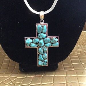 Large Native American turquoise in 925 Silver cross pendant.  measures 3”x 2.5”
